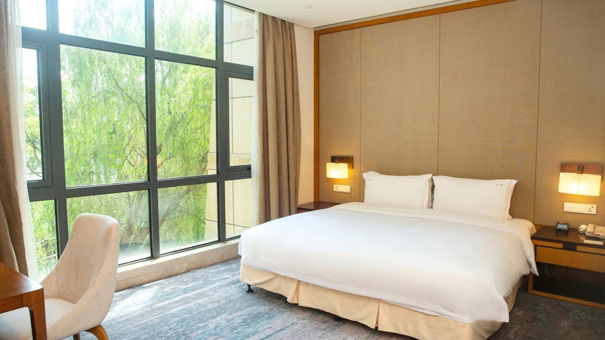 Holiday Inn Kunshan Huaqiao By Ihg Exterior foto
